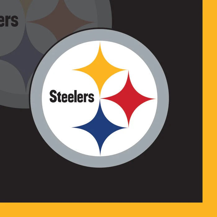 NFL team party supplies including plates, napkins, and cups set up for a game day watch party