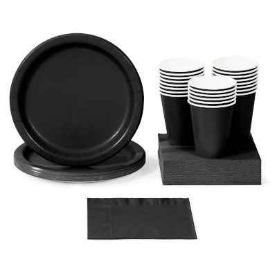 Black plastic and paper plates, napkins, cups, bowls, and utensils